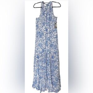 This Vince Camuto dress features a high neck and sleeveless design XL